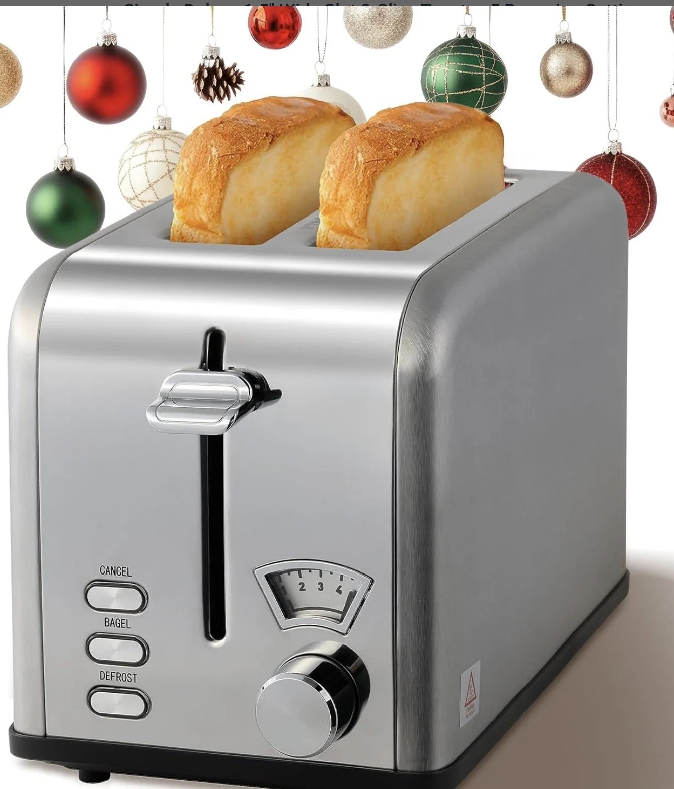 A stainless steel toaster with two slices of bread popping up, set against a festive holiday background with ornaments and pinecones.