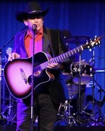 Country music entertainer Johnny Lee Howard as Geoge Stait in Honky-Tonk STRAIT a live tribute to the king of country George Strait.
