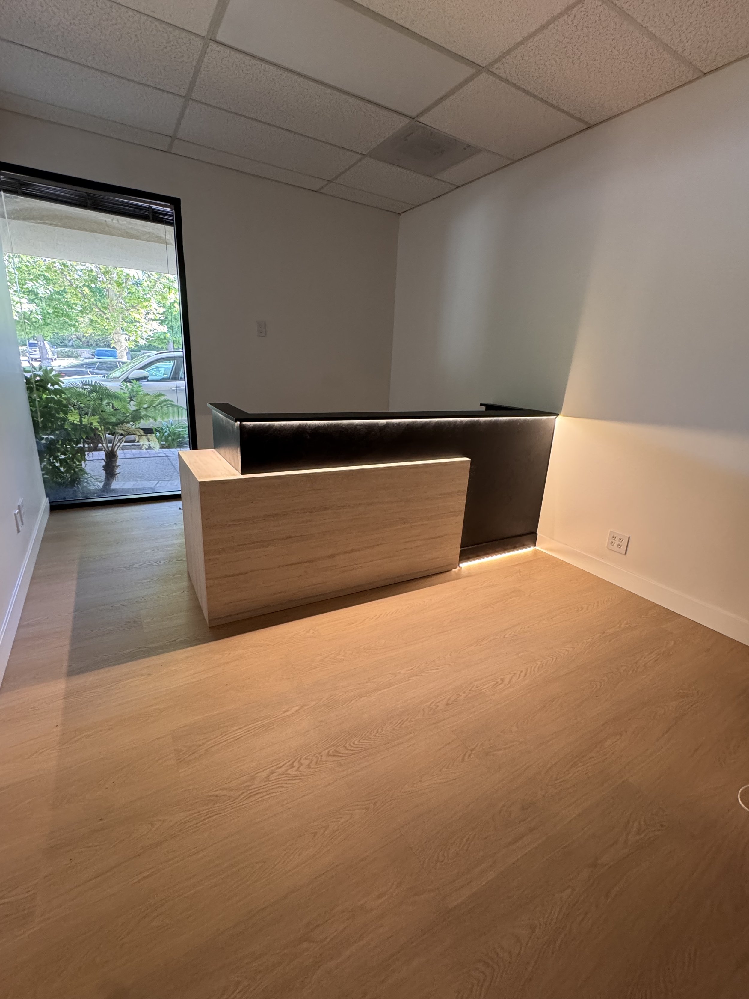 Commercial reception desk renovation by MejjaPro Solutions