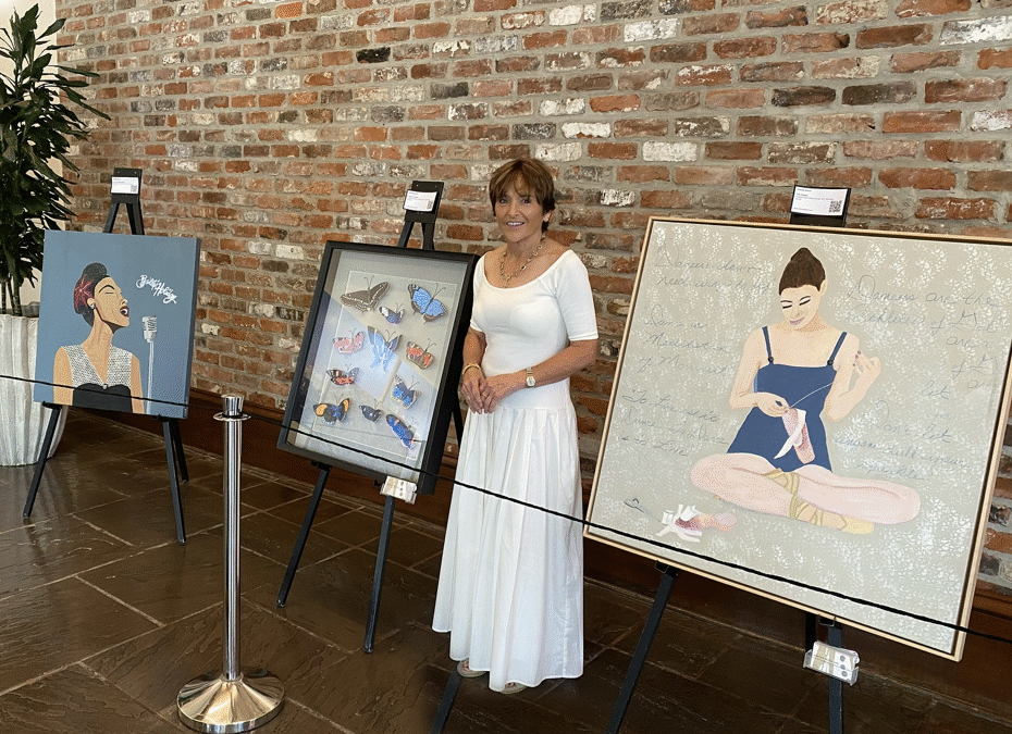A woman in a white dress standing in an art gallery with three artworks on display behind her, including a painting of a woman singing, a framed display of butterflies, and a girl knitting.