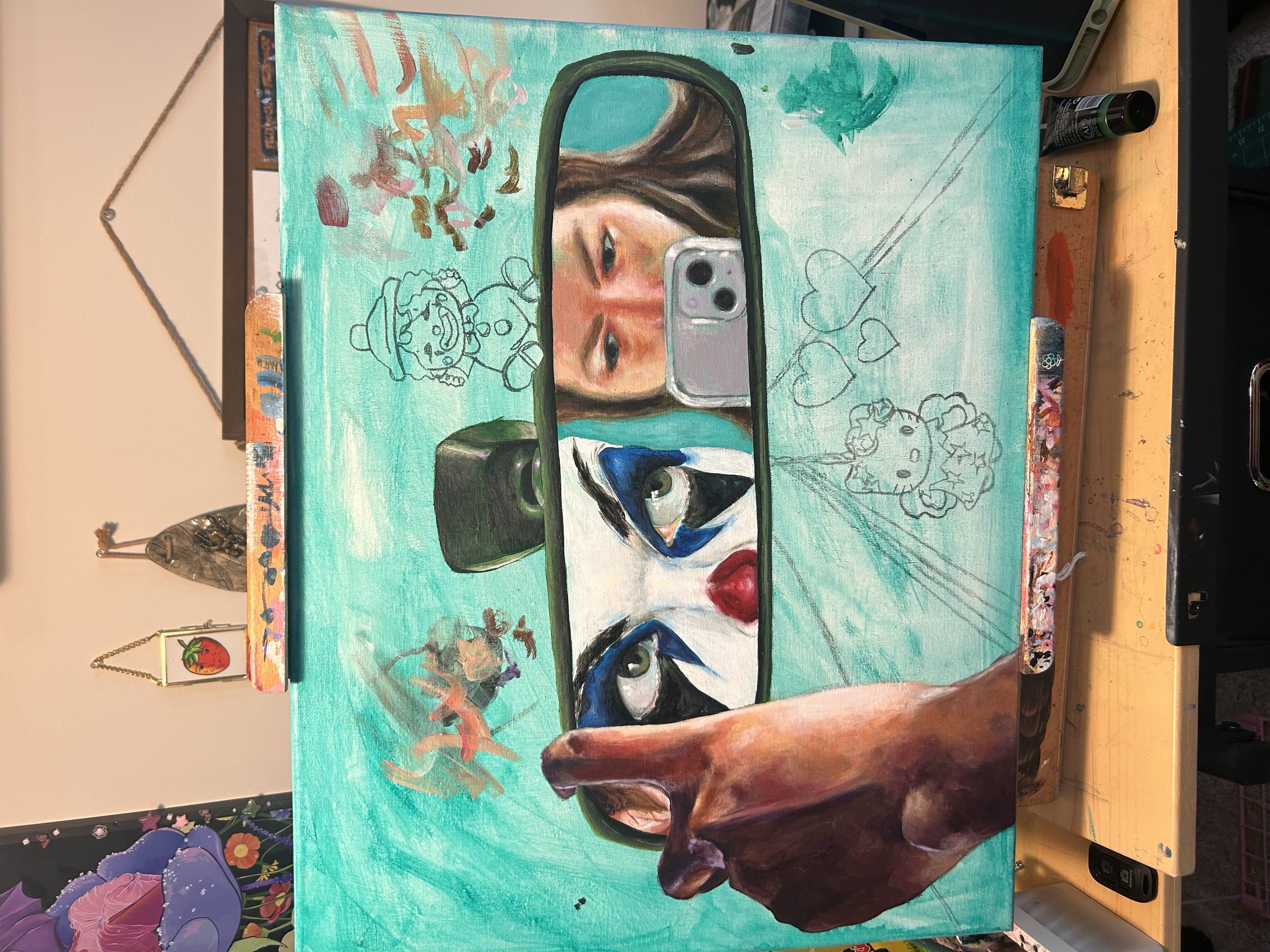 A painting of a woman holding a smartphone, with her face reflected in a mirror. The painting includes a realistic eye and lips at the bottom, and various sketches and doodles, such as hearts, animals, and characters, on the background.