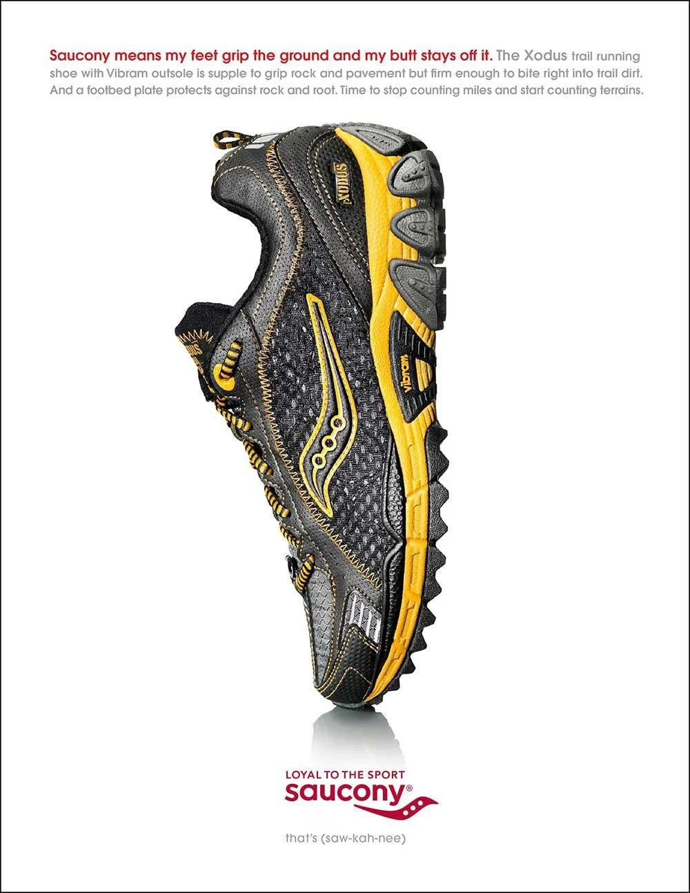 A Saucony trail running shoe in black and yellow with rugged tread. The image is part of an advertisement highlighting the shoe's grip and durability.