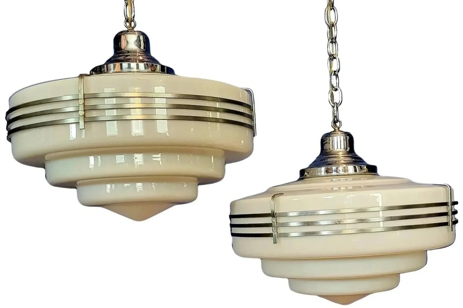 Pair of Art Deco pendant lights with silver rings around round white glass shade