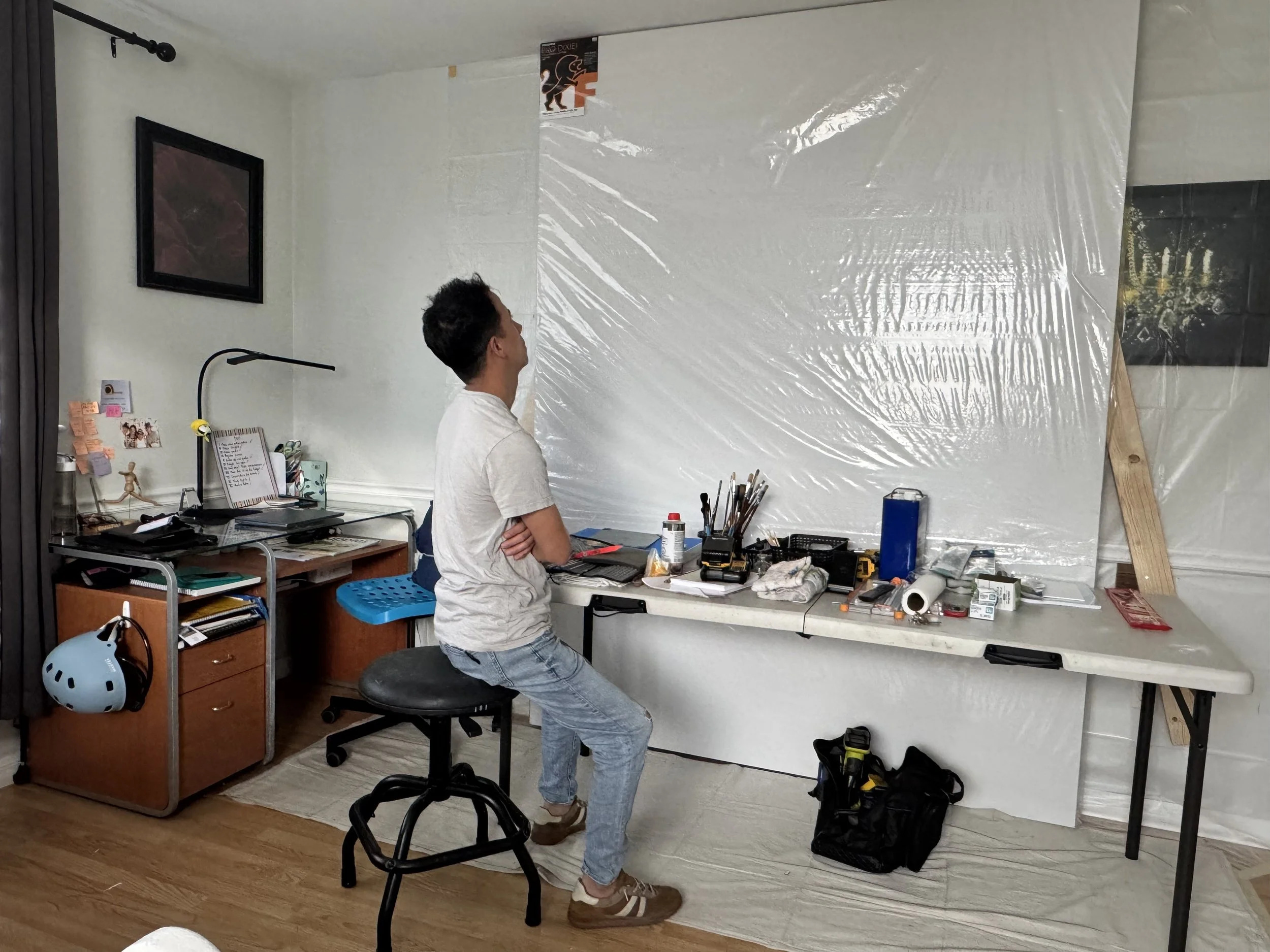 Joe Bertucci seated in his studio before beginning the Behold commission