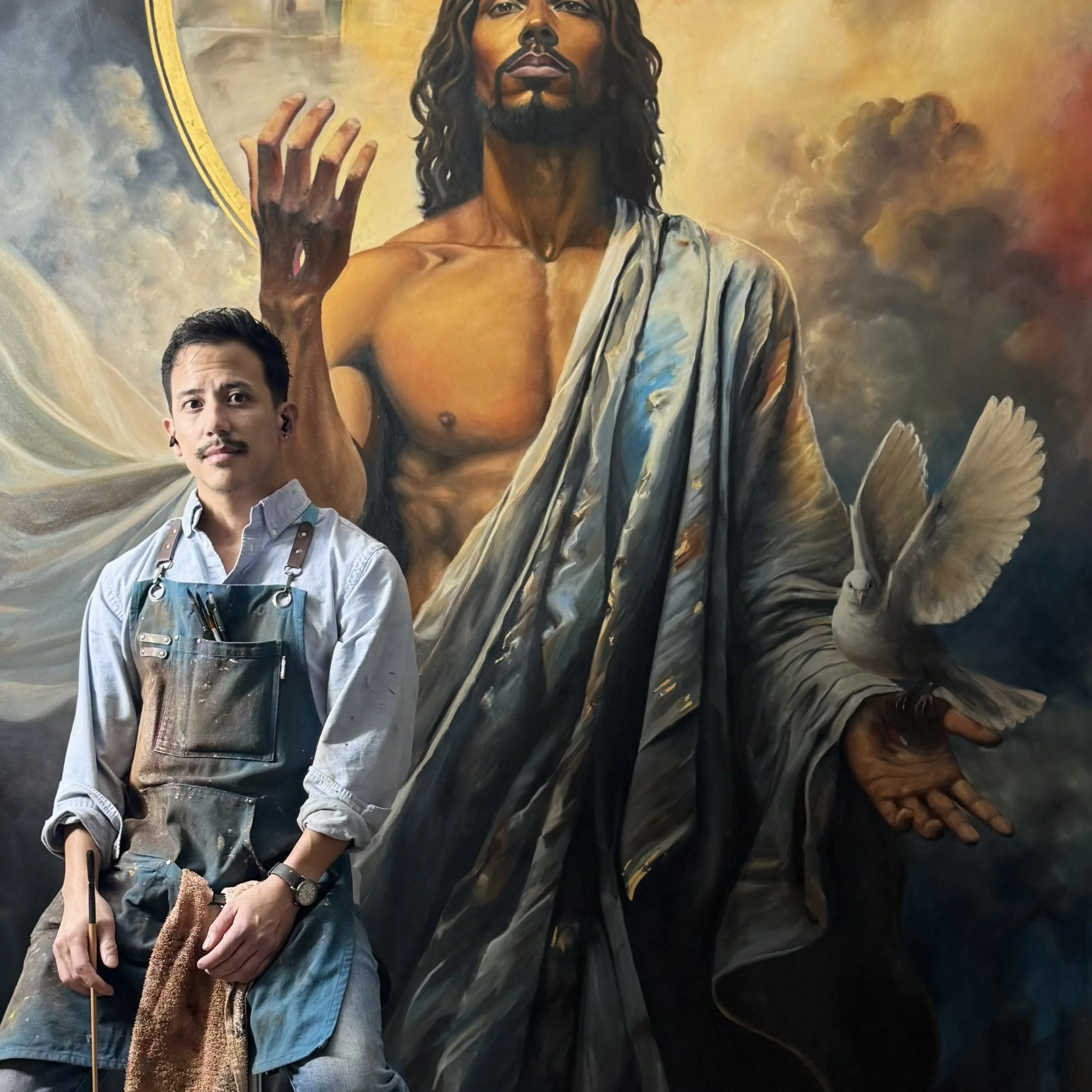 Joe Bertucci standing with Behold during the painting process