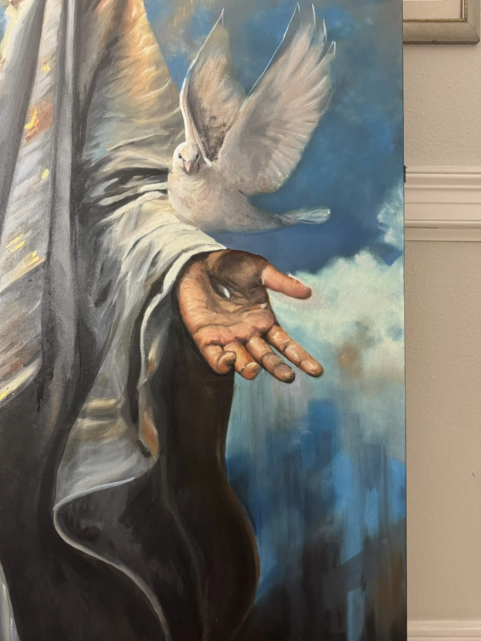 Detail of the dove flying from Christ’s hand in Behold