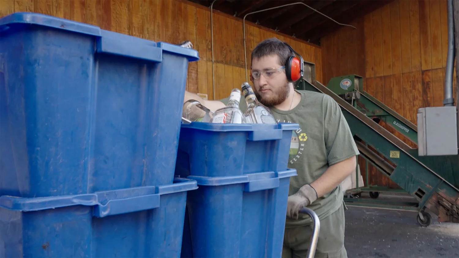 SOC crew member sorting recycling