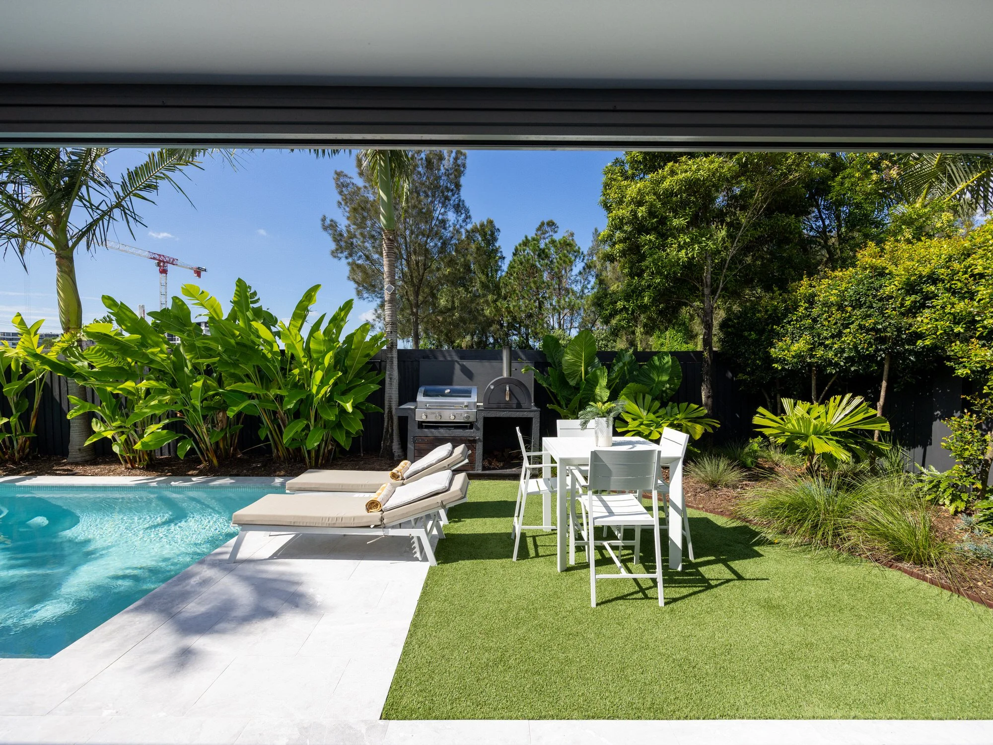 oyster-image-house-backyard-pool-tropical-garden-outdoor-entertaining-real-estate.jpg
