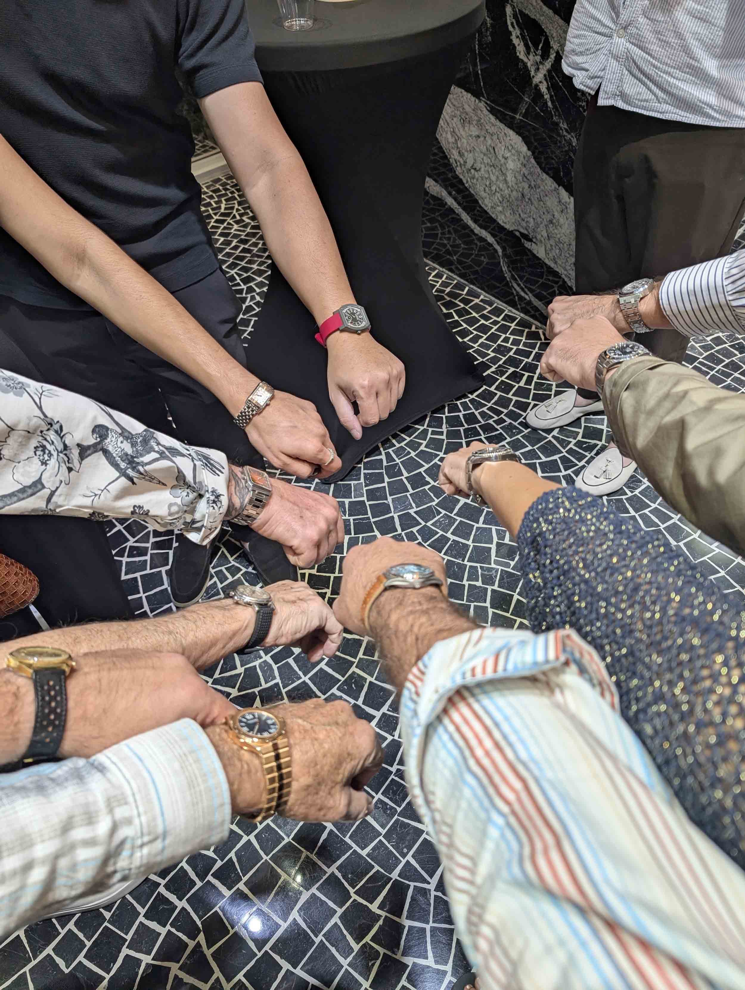 Wristcheck Palm Beach Watch Club showing a Cartier, F.P. Journe and Rolex.