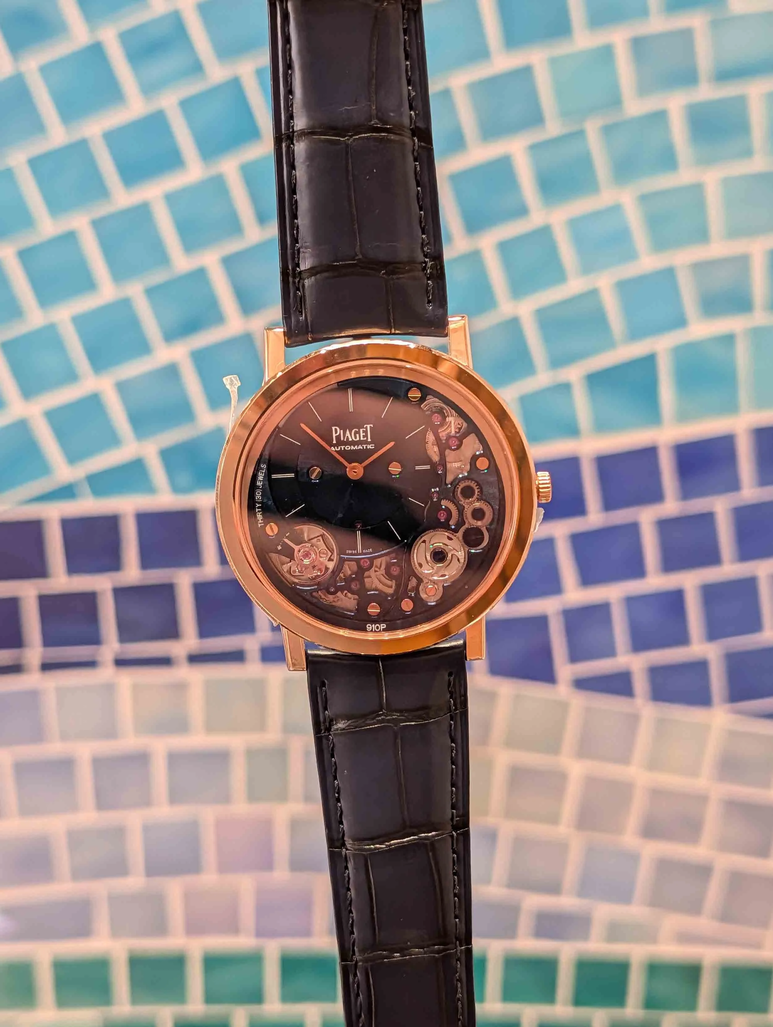 Skeletonized Piaget Altiplano 18k gold watch displayed at the Palm Beach Watch Club on Worth Avenue.