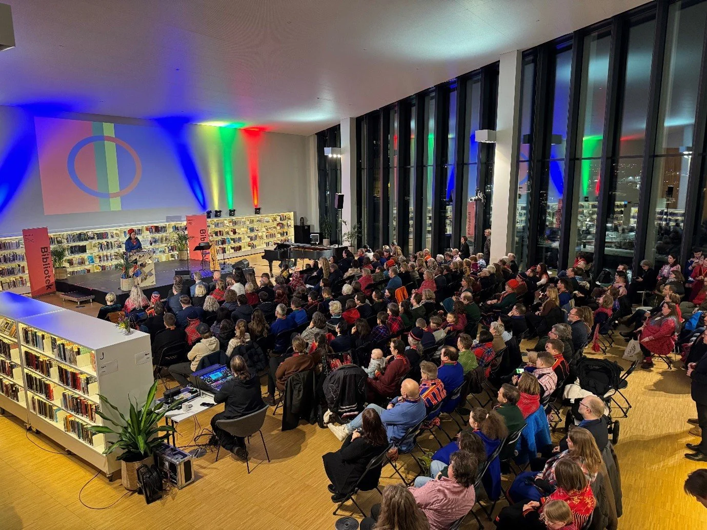 Event inside the library, Sami flags on the wall