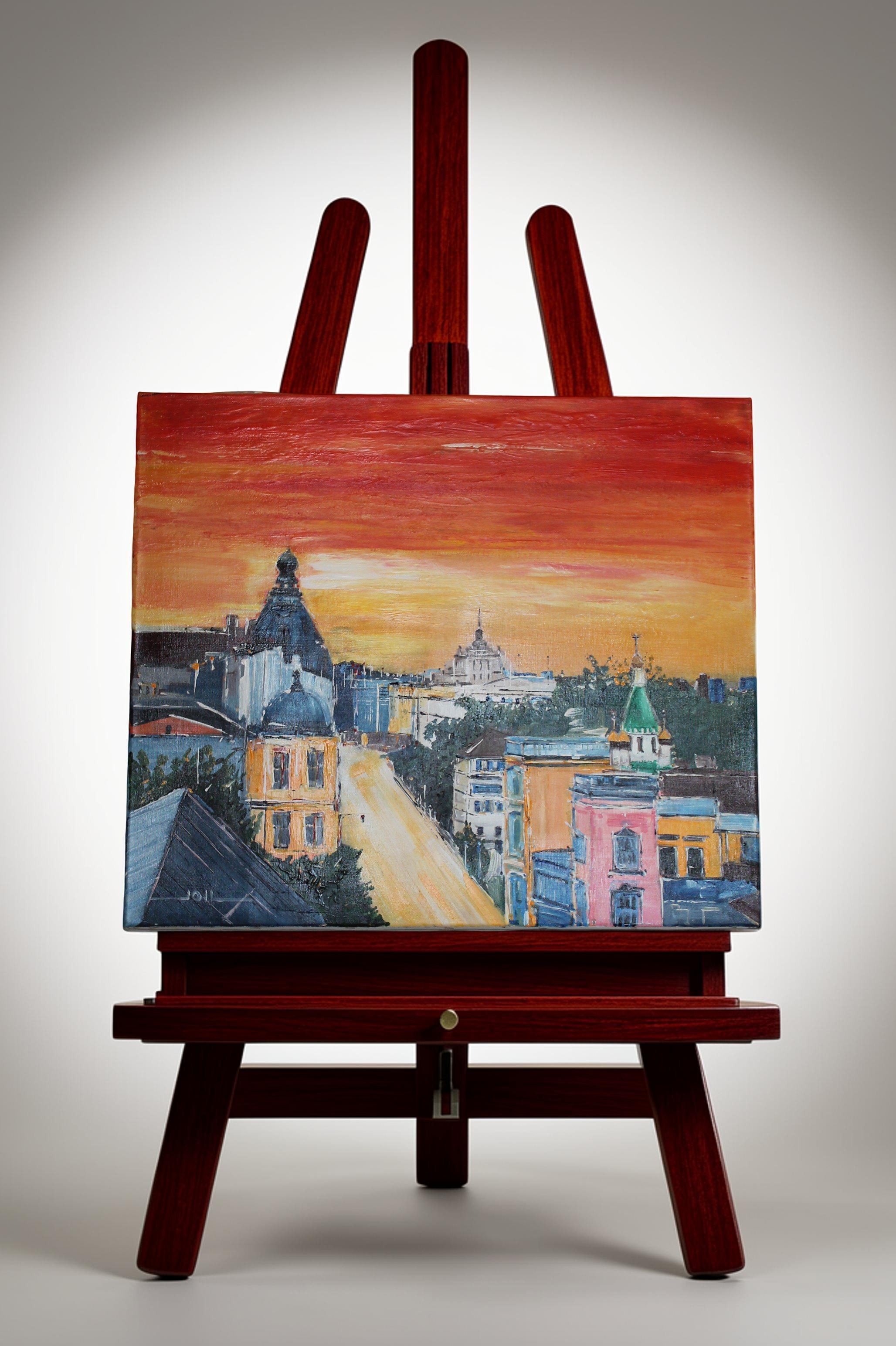 Ville au crépuscule 

Cette œuvre propose une vision sensible et vibrante d’un paysage urbain saisi à l’heure du crépuscule. La composition s’organise autour d’une perspective centrale qui guide le regard à travers l’architecture, reliant les façades