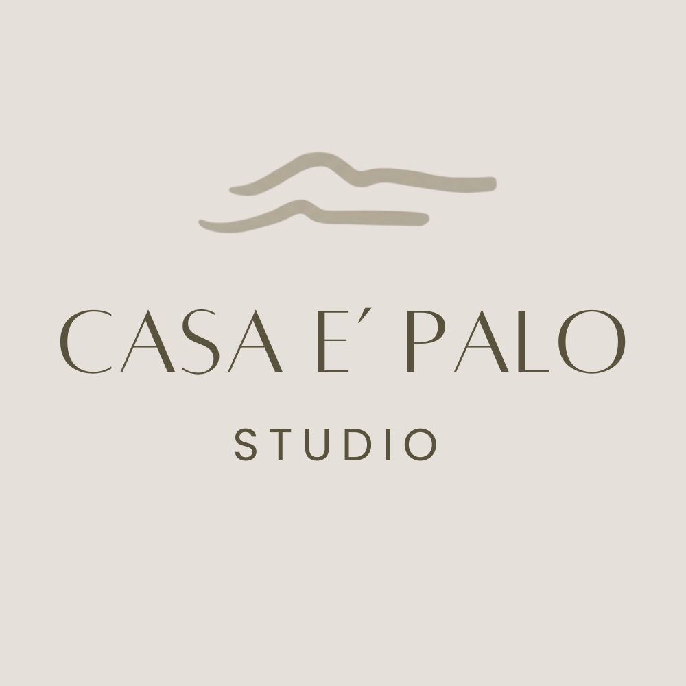 Logo for Casa E' Palo Studio featuring minimalist drawing of mountain or hill and text in elegant font.