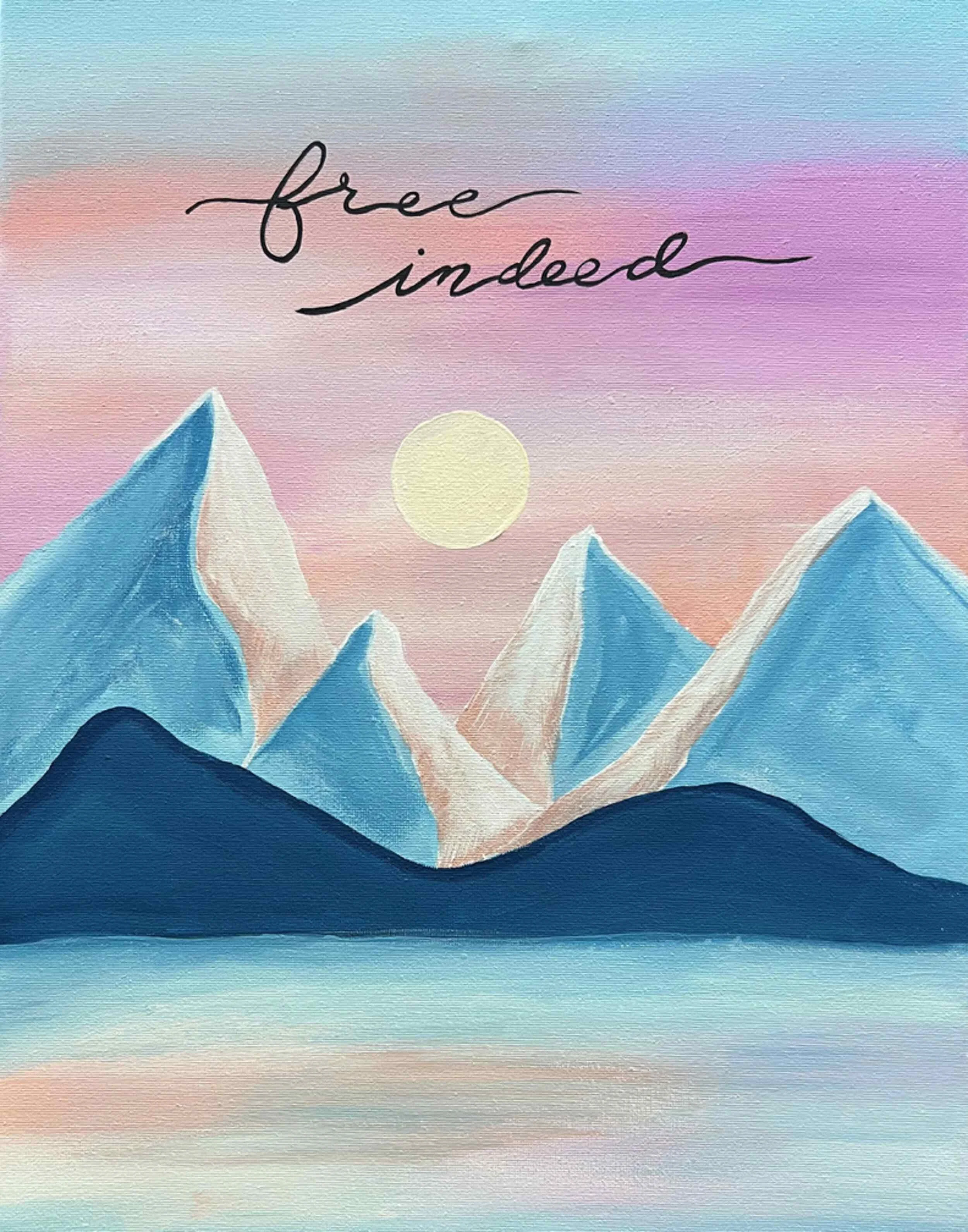 A painting of snowy mountains with a pastel pink and purple sky and a setting or rising sun. The words "free indeed" are written in cursive at the top.