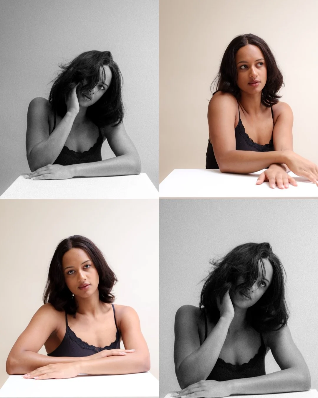 A woman with shoulder-length dark hair, wearing a black spaghetti strap top, is shown in four images: top left in black and white with her hand on her face; top right in color with her arms crossed on the table; bottom left in color with her arms folded on the table; bottom right in black and white with her hand on her face.