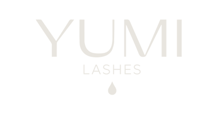 YUMI Lashes logo with text and a tear drop symbol