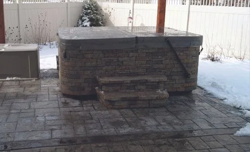 Spartan-Concrete-Services-StampConcretePatio-HOTTUB.jpg