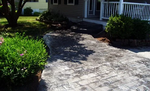 SpartanConcreteServices-walkway-porch-to-driveway.jpg