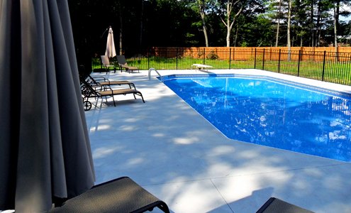 Spartan-Concrete-Services-StampConcretePoolPatio-relax.jpg