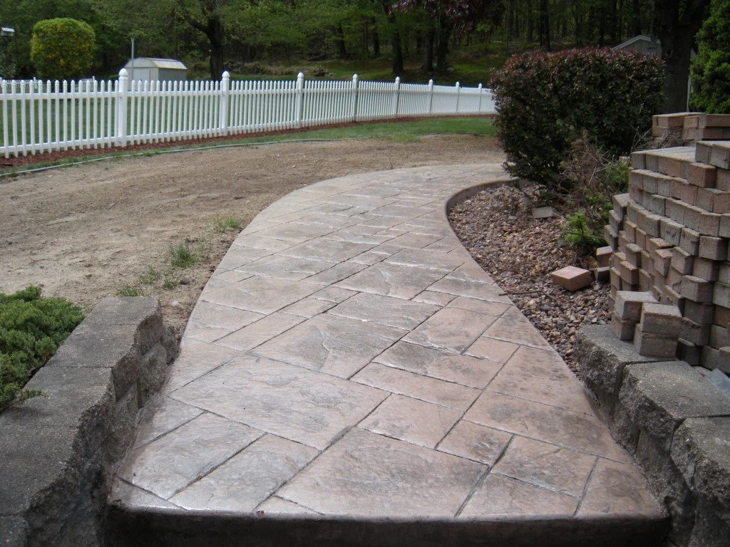 SpartanConcreteServices-walkway-team-stamp-curve.jpg