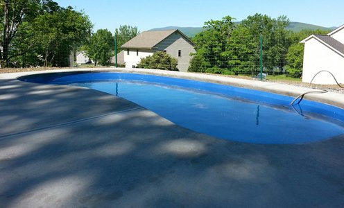 Spartan-Concrete-Services-StampConcretePoolPatio-bean.jpg