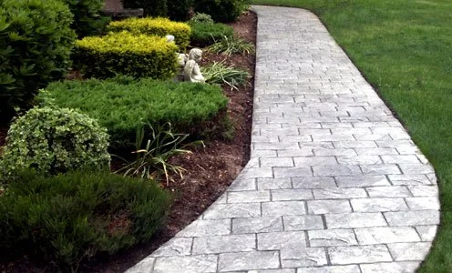 SpartanConcreteServices-stamp-walkway-bushed.jpg