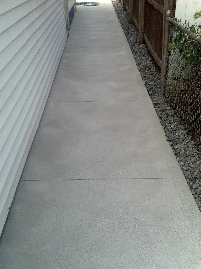 SpartanConcreteServices-walkway-sideyard.jpg