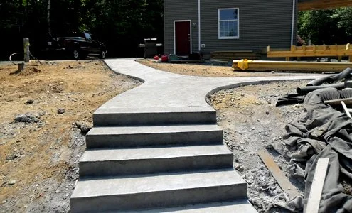 SpartanConcreteServices-ConcreteWalk-CurvedStairs-Landing.jpg