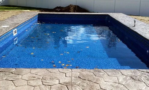 Spartan-Concrete-Services-StampConcretePoolPatio-inground.jpg