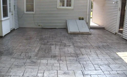Spartan-Concrete-Services-StampConcretePatio-basement-hatchway.jpg