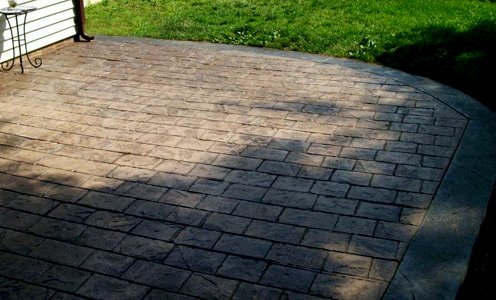 SpatanConcreteServices-curve-stamp-patio.jpg