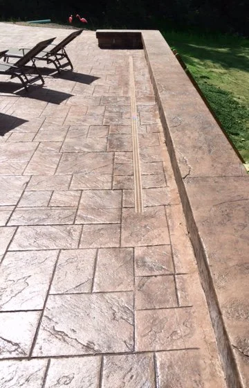 Spartan-Concrete-Services-StampConcretePatio-LEDGE.jpeg