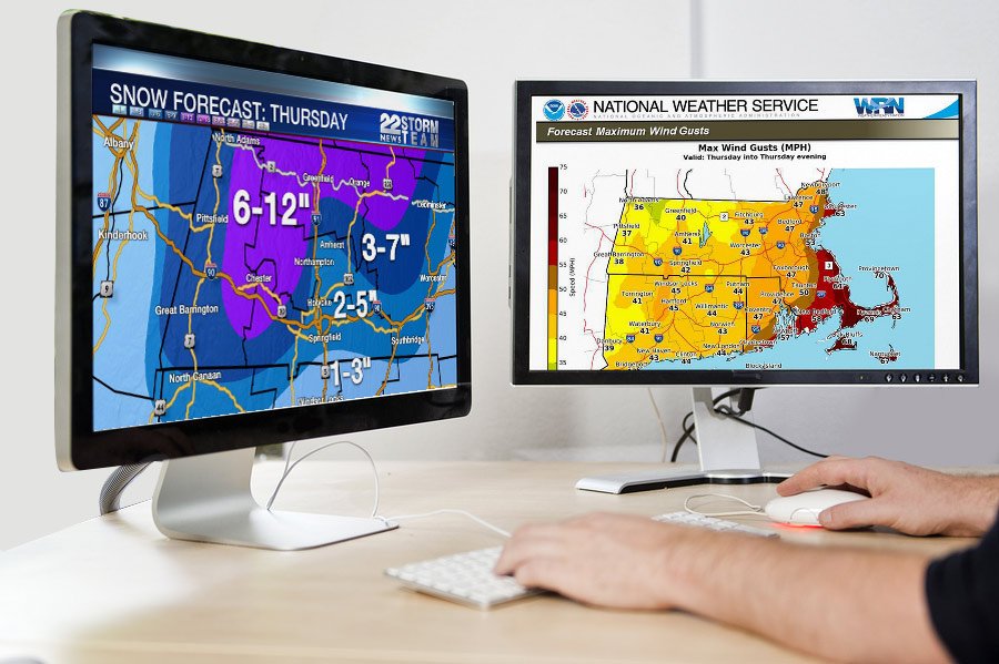 Two computer screens displaying weather forecasts; one shows snow accumulation predictions in inches for different areas, and the other displays maximum wind gusts in miles per hour across the region.
