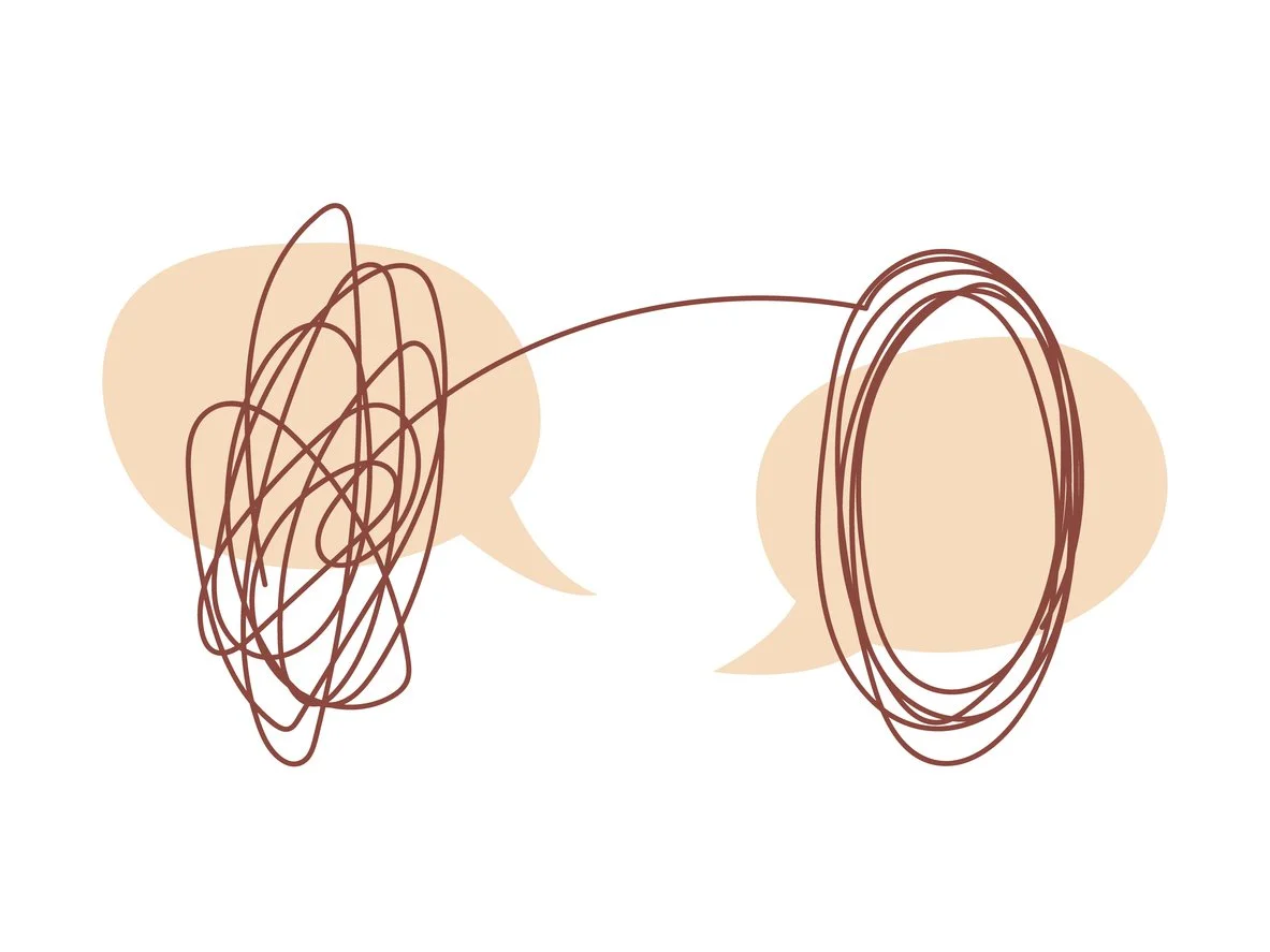 Two speech bubbles with scribbled lines connecting them, representing a conversation.