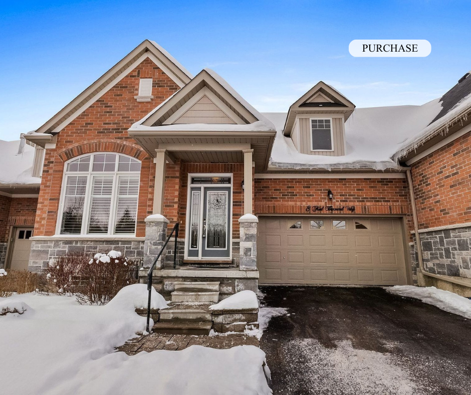 Front view of a brick house with snow on the ground and roof, with a sign labeled 'PURCHASE' pointing towards the house.