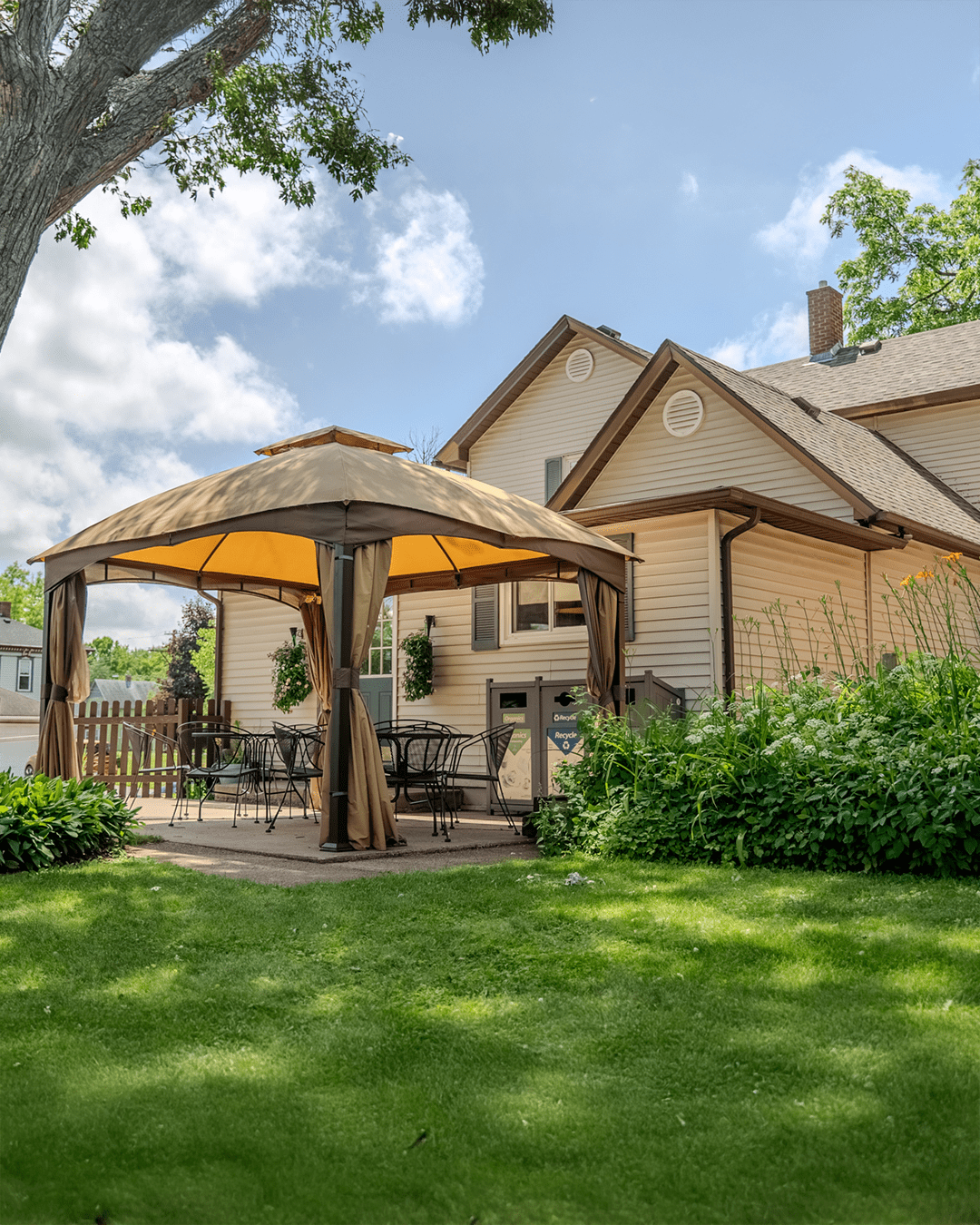 Backyard and patio view of The Retreat Home