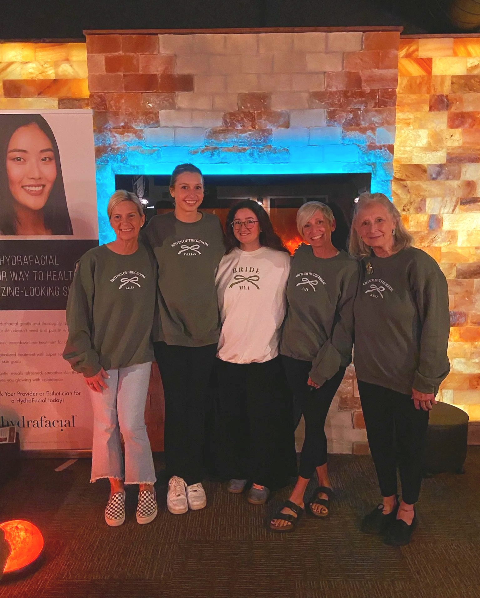 Group of 5 women standing together in the Serenity Lounge