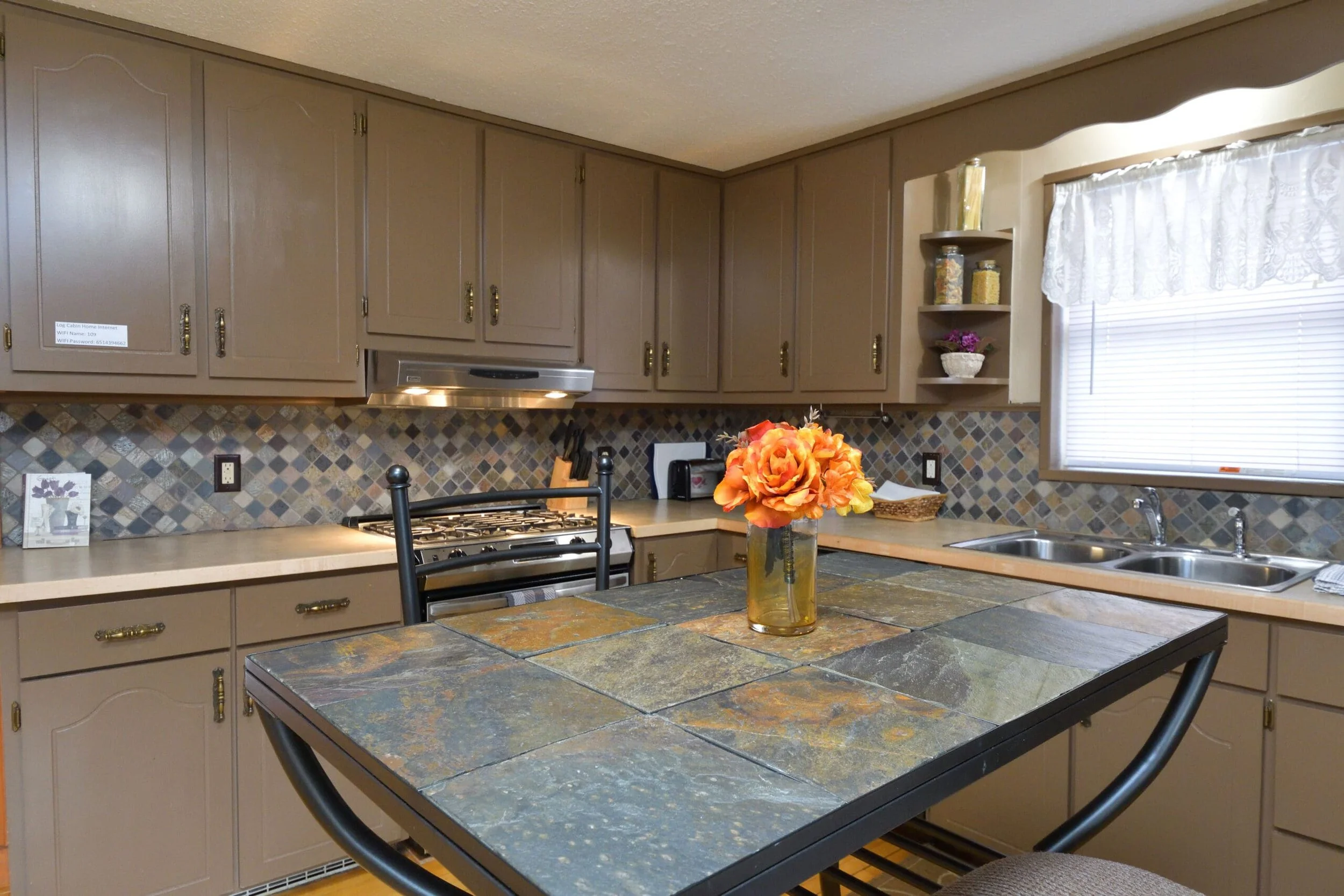 Kitchen in The Log Cabin home