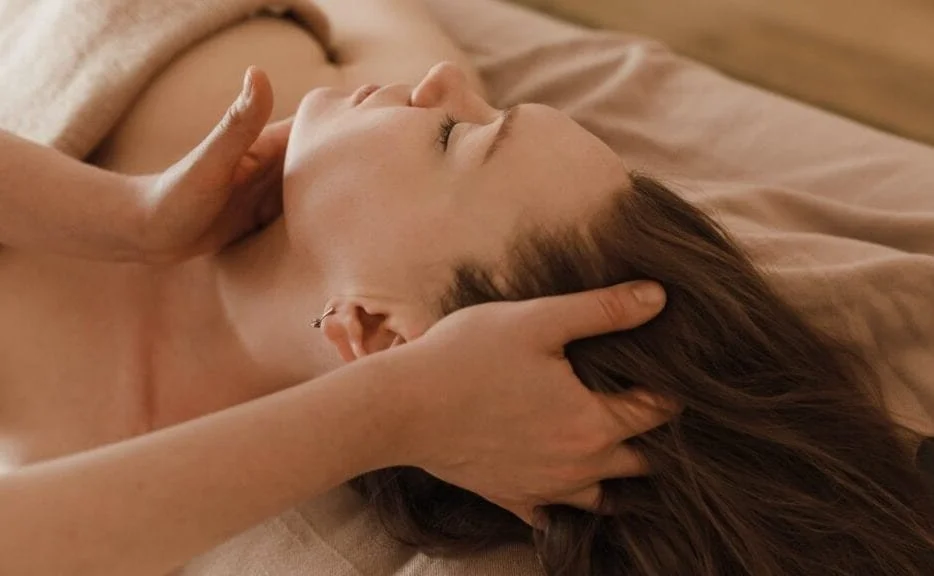 woman getting head & neck massage