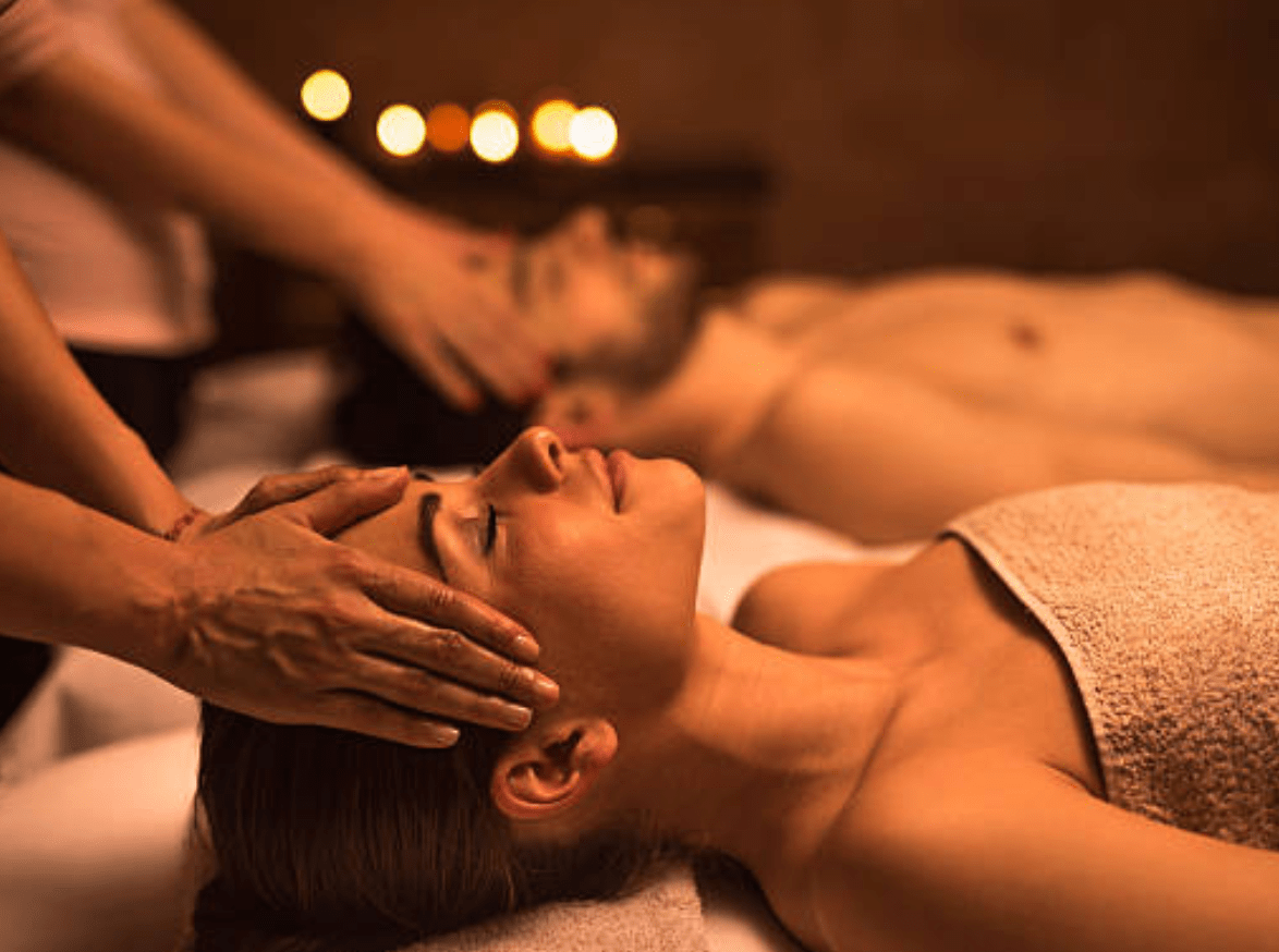 woman and man receiving couples massage
