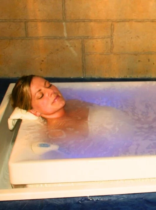 woman soaking in bathtub