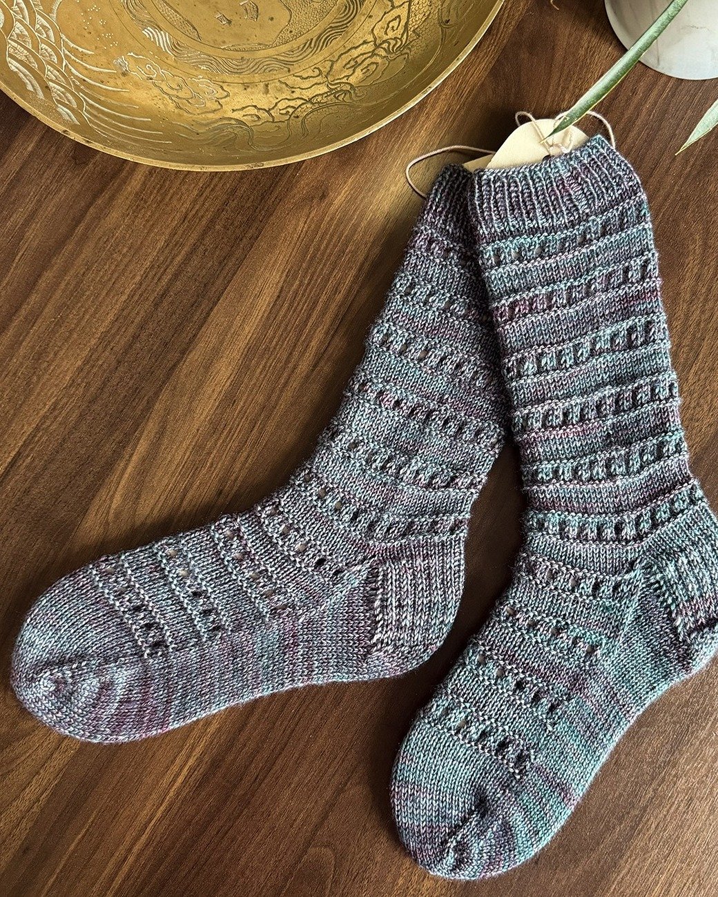 I've been working away on a brand-new sock design, and I'm so excited to finally start sharing a little peek.

Introducing the Pinholes Socks! 

I'm having so much fun with this design, and I can't wait to show you more as the pattern gets finalized.