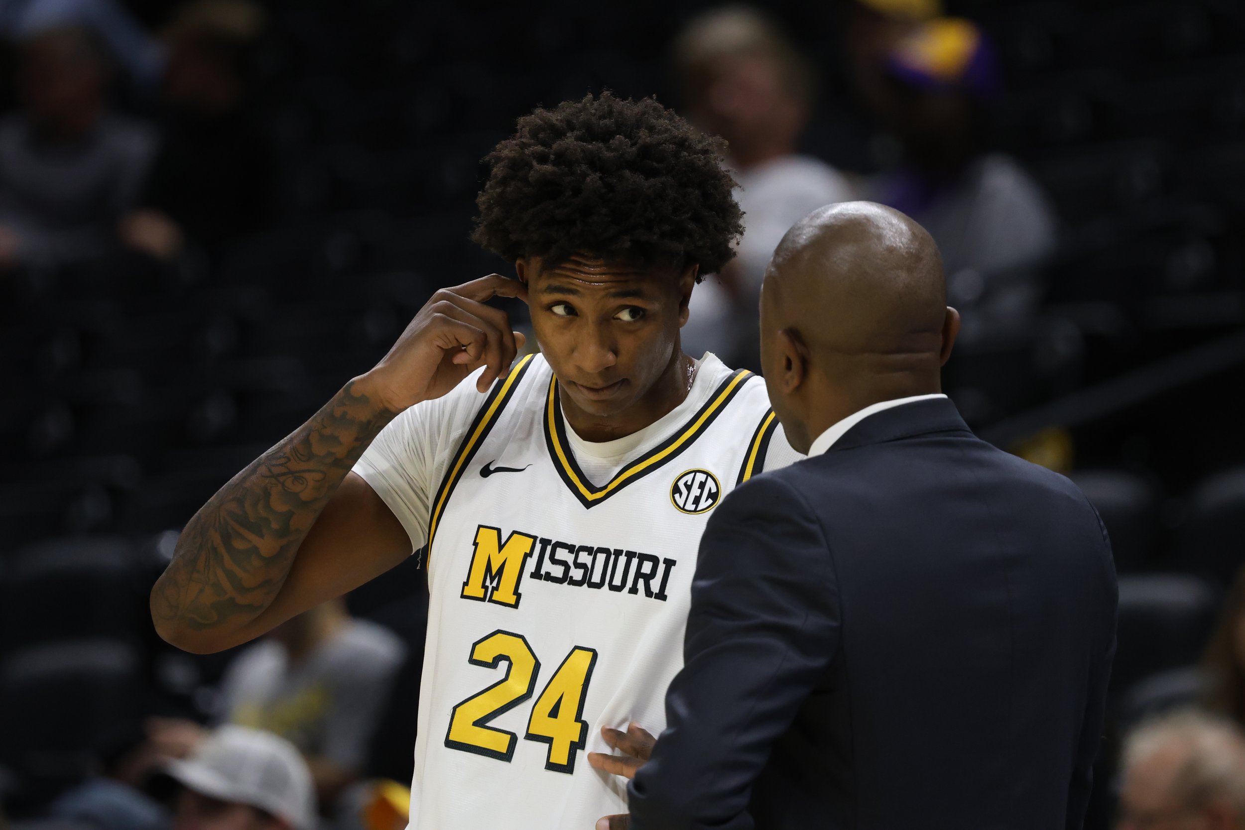 Mizzou freshman Nicholas Randall (24), left, talks to Head Coach Dennis Gates after fouling out in the second half of the game on Monday, Nov. 17, 2025, at Mizzou Arena in Columbia.