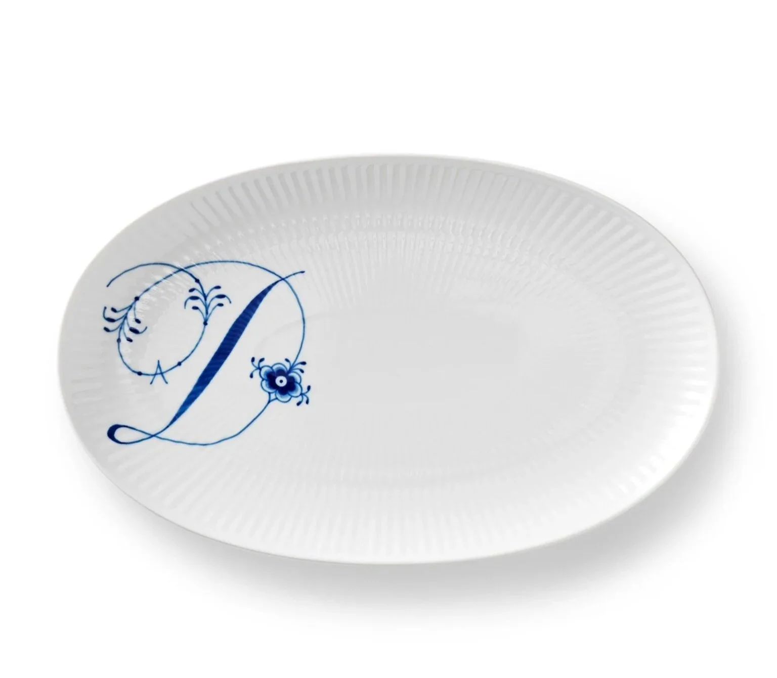 White oval disposable plate with a blue decorative letter 'D' and floral design on the left side.