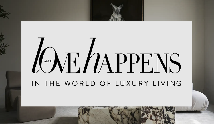 Interior of a luxury living room with a large sign that reads 'Mag ONE Happens in the World of Luxury Living', decorated with modern furniture and artwork.