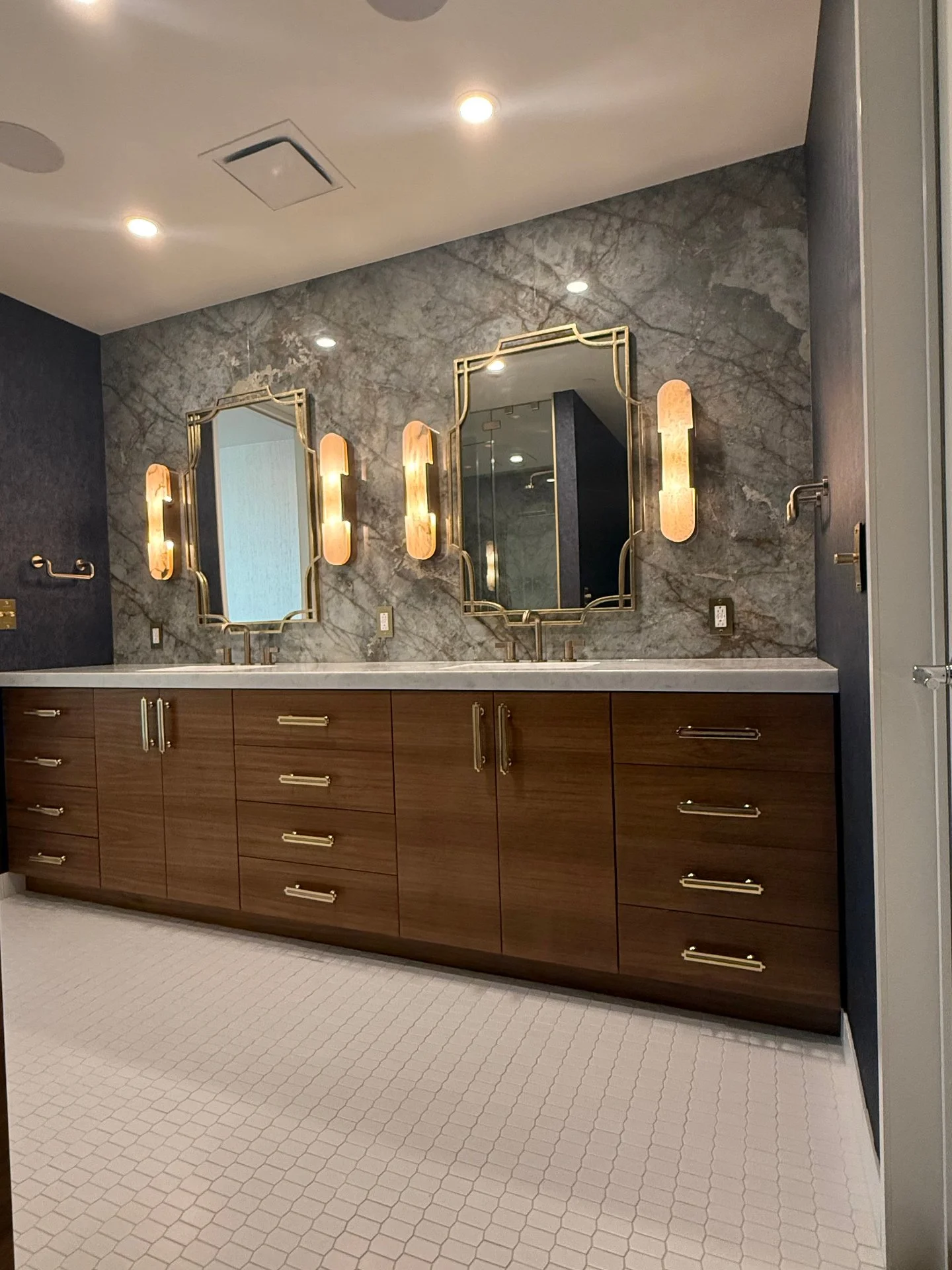 I was commissioned to redesign a bathroom in a high-end downtown Austin condo. The space had already been updated a few years earlier when the client bought the unit, so it was in good shape&mdash;but they wanted something more elevated. I was all in