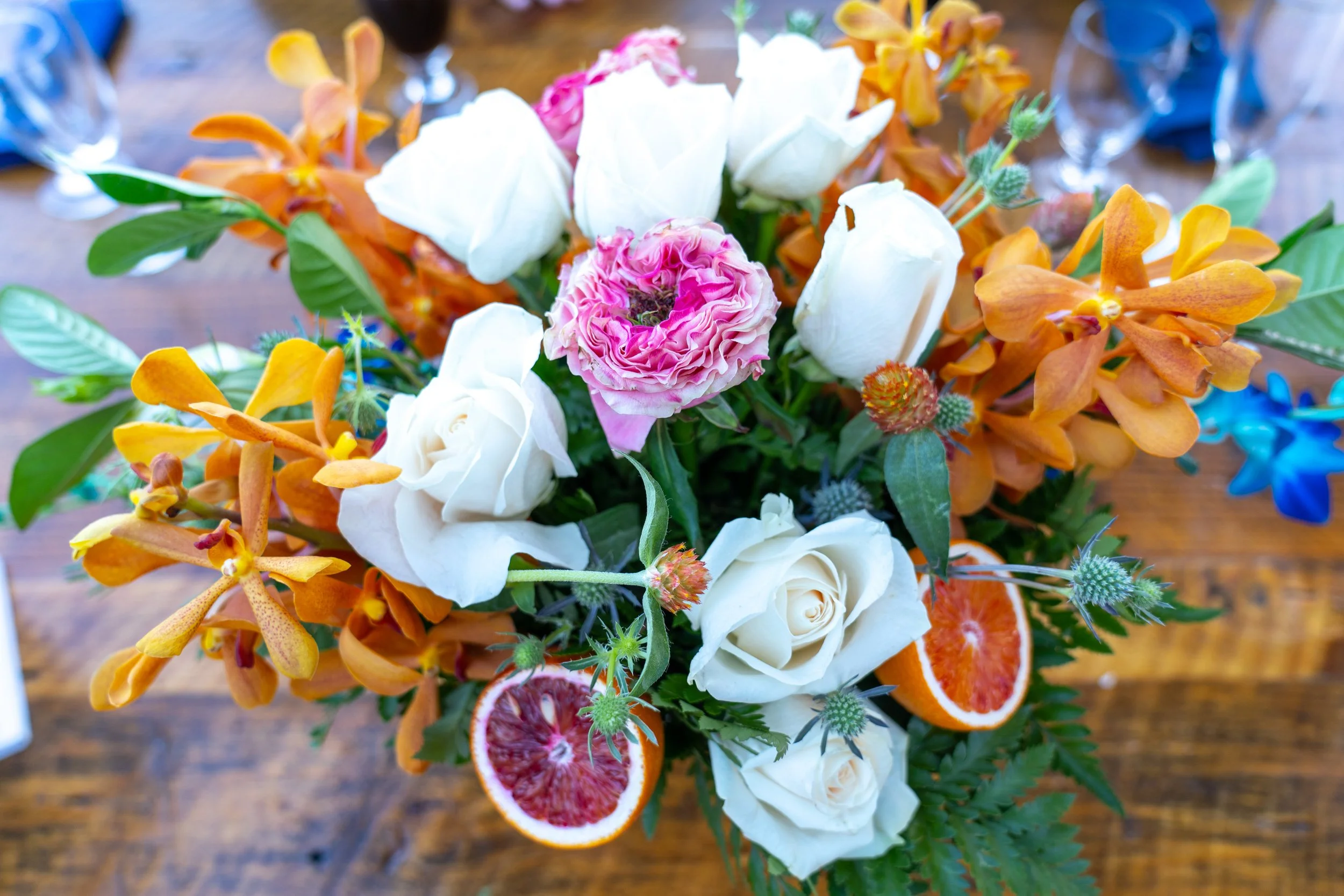 Orange and white bouquet with blood oranges