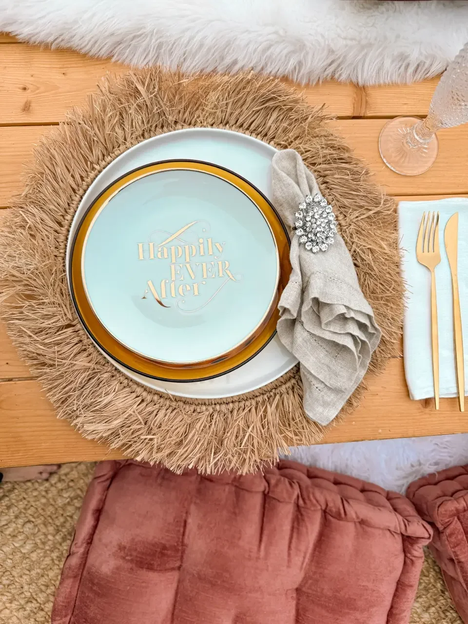 Picnic tablescape with boho pillows and textiles