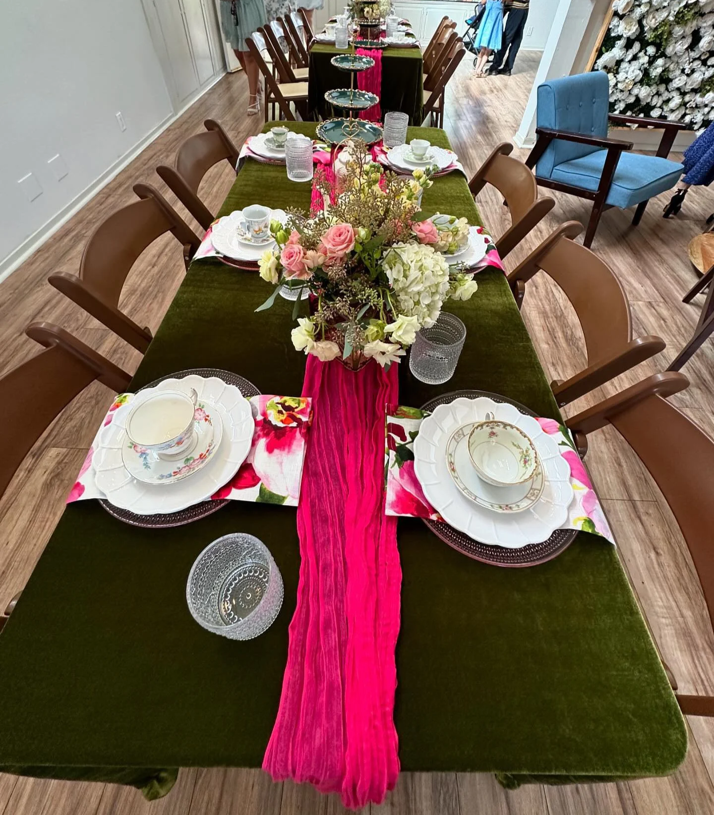 High Tea Tablescape with fancy white china tea set and flower centerpiece