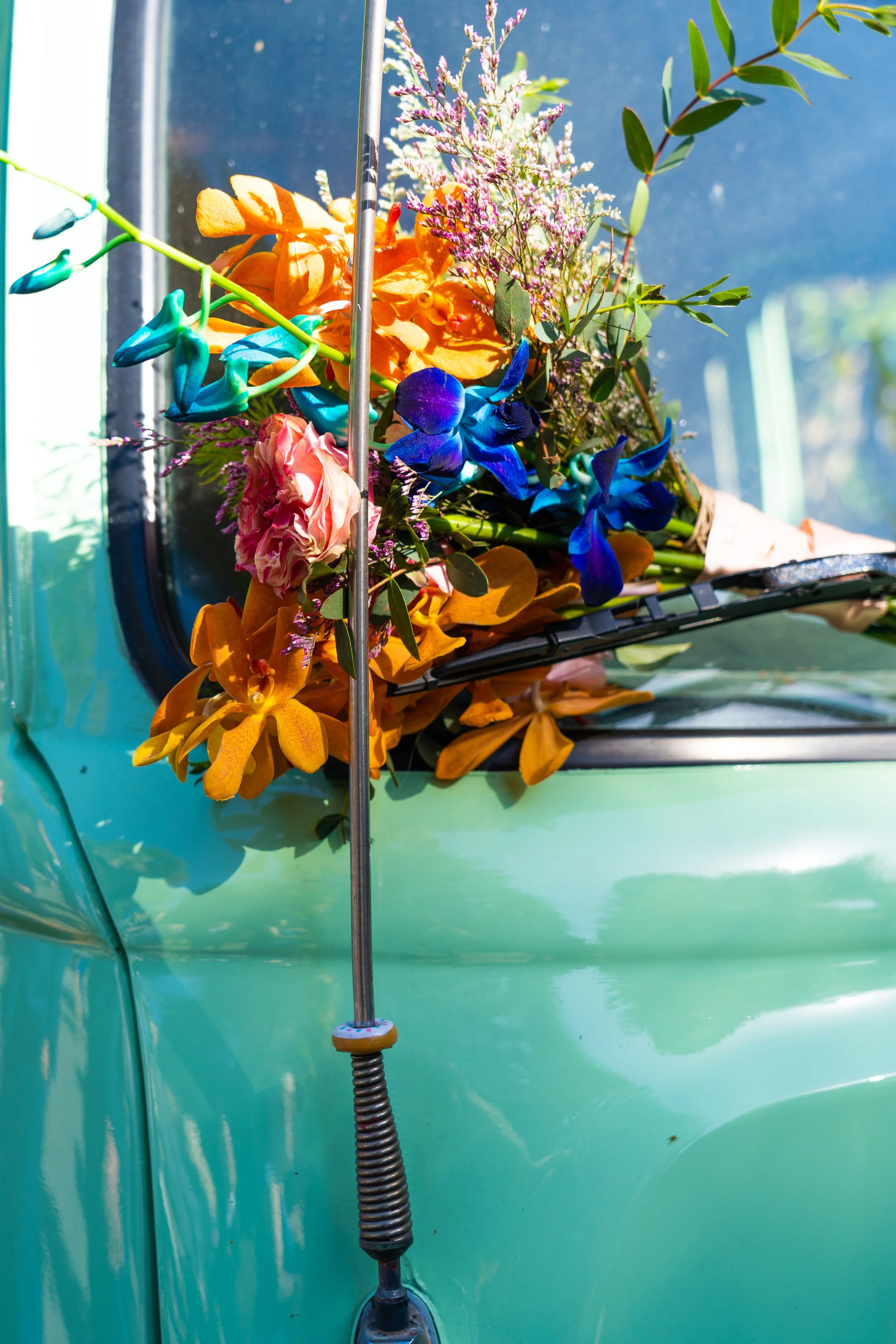 Flower bouquet on vintage green truck - Wedding Decor